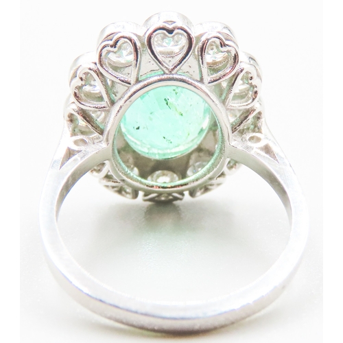 76 - Emerald Centre Stone Ring with Twelve Diamond Set Halo Surround Mounted in Platinum Emerald Carat We... 