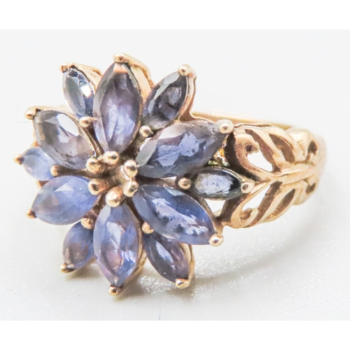 84 - Amethyst Set Floral Form Ring Mounted in 9 Carat Yellow Gold Ring Size N and a Half