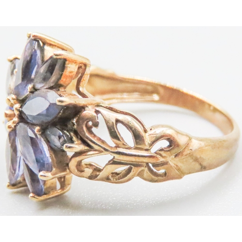 84 - Amethyst Set Floral Form Ring Mounted in 9 Carat Yellow Gold Ring Size N and a Half