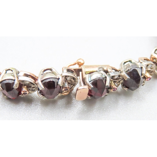 87 - Garnet Set Bracelet with Further Diamond and Ruby Decoration to Setting Set in Silver Mounted on 9 C... 