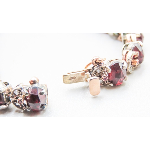 87 - Garnet Set Bracelet with Further Diamond and Ruby Decoration to Setting Set in Silver Mounted on 9 C... 