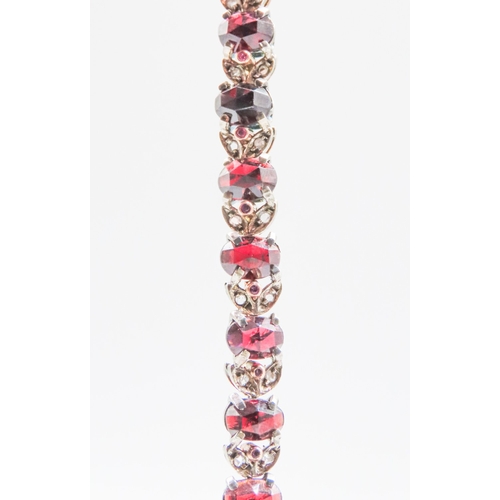 87 - Garnet Set Bracelet with Further Diamond and Ruby Decoration to Setting Set in Silver Mounted on 9 C... 