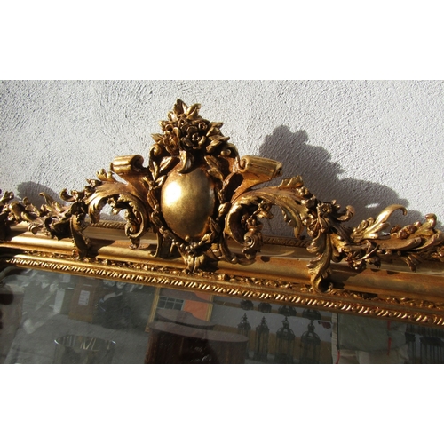 1712 - Gilded Overmantle Mirror with Upper Cherub Motif Decoration Approximately 52 Inches Wide x 58 Inches... 