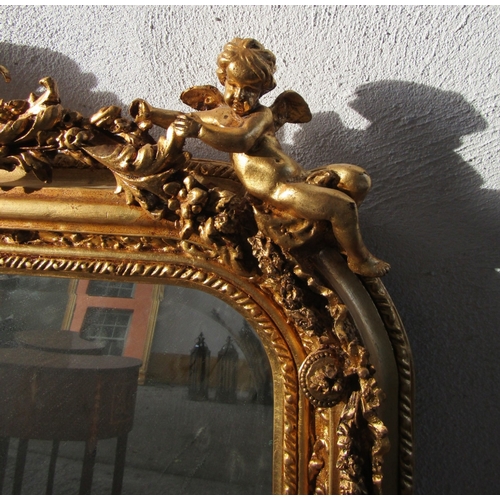 1712 - Gilded Overmantle Mirror with Upper Cherub Motif Decoration Approximately 52 Inches Wide x 58 Inches... 