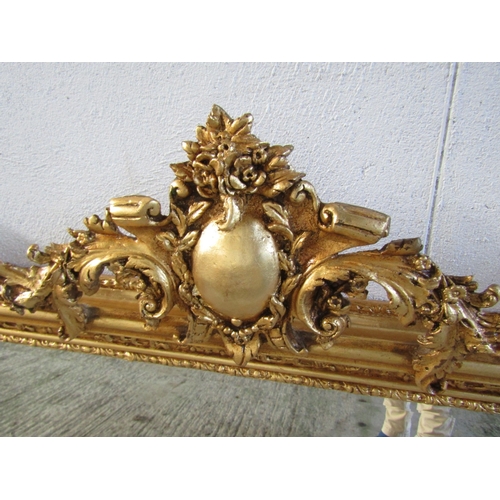 1718 - Gilded Mirror with Upper Cherub Motif Decoration Approximately 56 Inches Wide x 36 Inches High