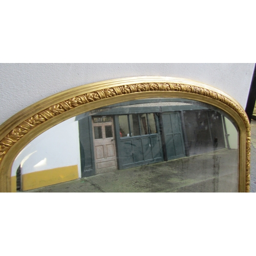 1719 - Archtop Gilded Overmantle mirror with Carved Edge Decoration Approximately 56 Inches Wide x 60 Inche... 