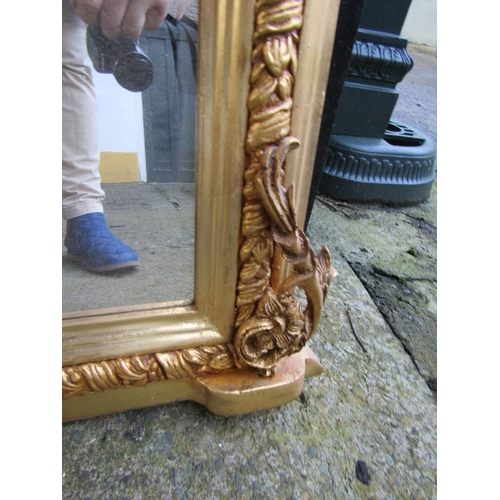 1719 - Archtop Gilded Overmantle mirror with Carved Edge Decoration Approximately 56 Inches Wide x 60 Inche... 