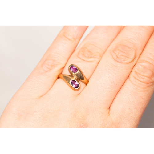 10 - Bezel Set Amethyst Twin Stone Wrap Around Form Ring Mounted in 9 Carat Yellow Gold Ring Size N and a... 