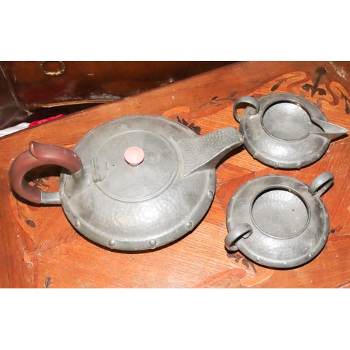 1056 - Arts and Crafts Three Part Tea Set Hand Beaten Pewter