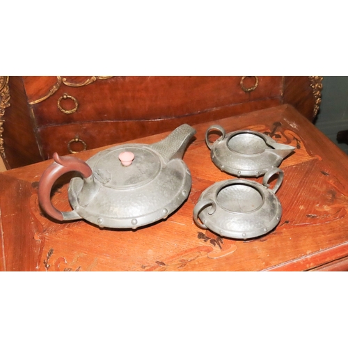 1056 - Arts and Crafts Three Part Tea Set Hand Beaten Pewter