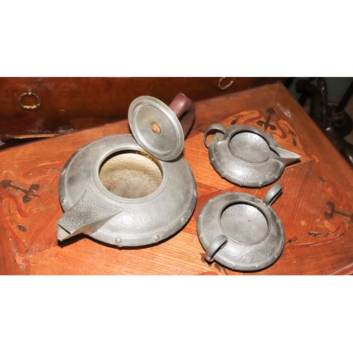 1056 - Arts and Crafts Three Part Tea Set Hand Beaten Pewter