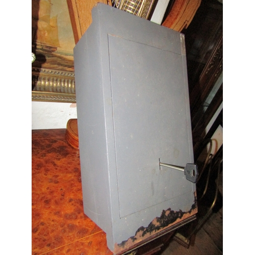 1059 - Wall Mounted Metal Safe with Key Working Order Wall Bolts Present Approximately 18 Inches High