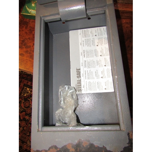 1059 - Wall Mounted Metal Safe with Key Working Order Wall Bolts Present Approximately 18 Inches High