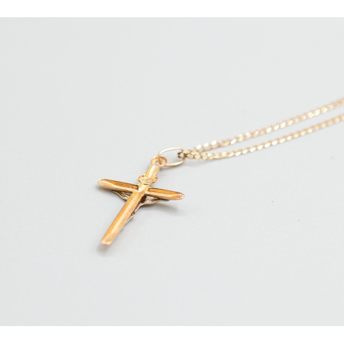 11 - 9 Carat Yellow Gold Crucifix Pendant 3cm High Set on 9 Carat Yellow Gold Chain 50cm Long