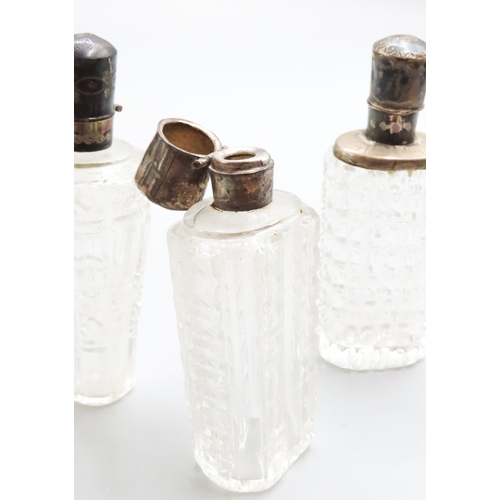 1249 - Four Silver Top Scent Bottles Largest Approximately 9cm High