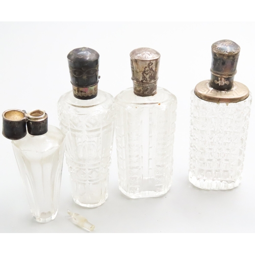 1249 - Four Silver Top Scent Bottles Largest Approximately 9cm High