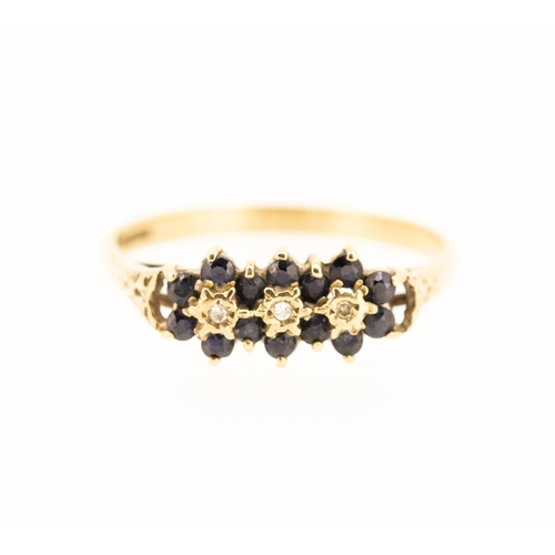 34 - Sapphire and Diamond Set Ladies Cluster Ring Mounted in 9 Carat Yellow Gold Ring Size V and a Half