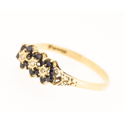 34 - Sapphire and Diamond Set Ladies Cluster Ring Mounted in 9 Carat Yellow Gold Ring Size V and a Half