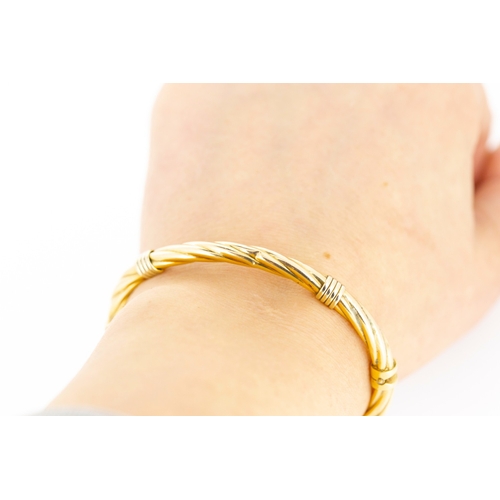 38 - 9 Carat Yellow Gold Twist Form Bangle Bracelet 6cm Inner Width