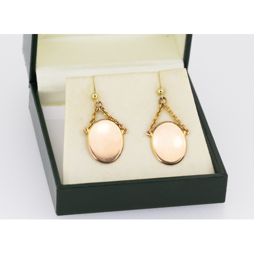 59 - Pair of 9 Carat Rose Gold Swivel Disc Form Earrings Each 2cm Drop