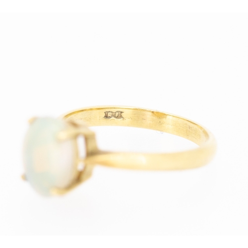 67 - Opal Four Claw Set Single Stone Ring Mounted in 9 Carat Yellow Gold Ring Size L