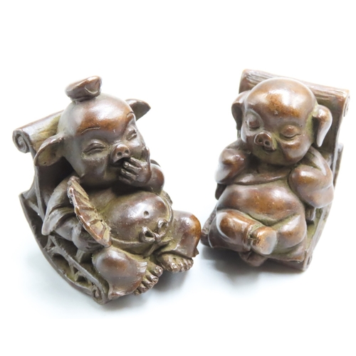 Pair of Japanese Bronze and Scroll Rest Porcine Figures Each Approximately 5cm High