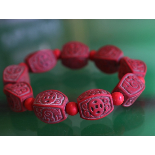 1007 - Cinnabar Carved Bracelet with Bead Spacers