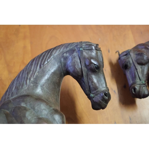 1034 - Pair of North African Leather Upholstered Horse Figures Largest Approximately 18 Inches Wide