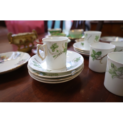 1070 - Various Table Porcelain Including Attractively Detailed Cups and Saucers Quantity as Photographed