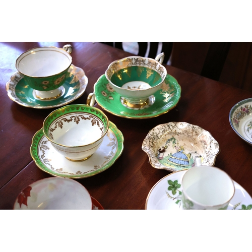 1070 - Various Table Porcelain Including Attractively Detailed Cups and Saucers Quantity as Photographed