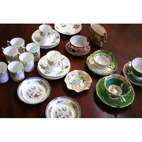 1070 - Various Table Porcelain Including Attractively Detailed Cups and Saucers Quantity as Photographed