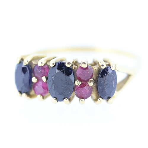 11 - Sapphire and Ruby Set Cluster Ring Mounted in 9 Carat Yellow Gold Ring Size O