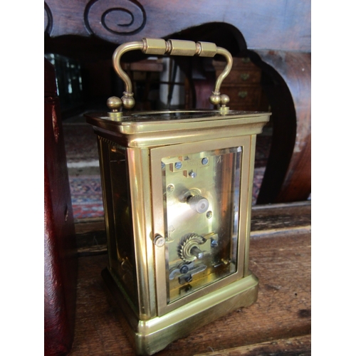 1121 - Leather Cased Brass Bound Carriage Clock Working with Key 6 Inches High Including Case