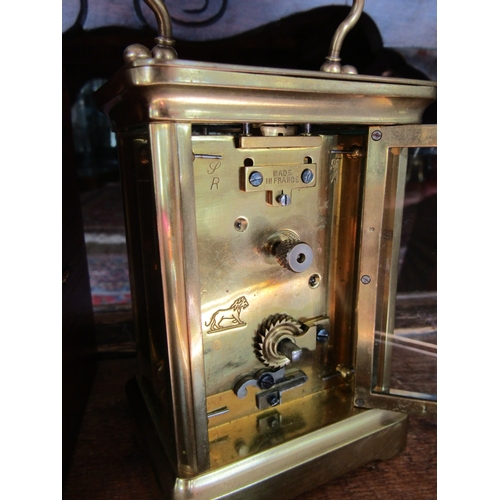 1121 - Leather Cased Brass Bound Carriage Clock Working with Key 6 Inches High Including Case