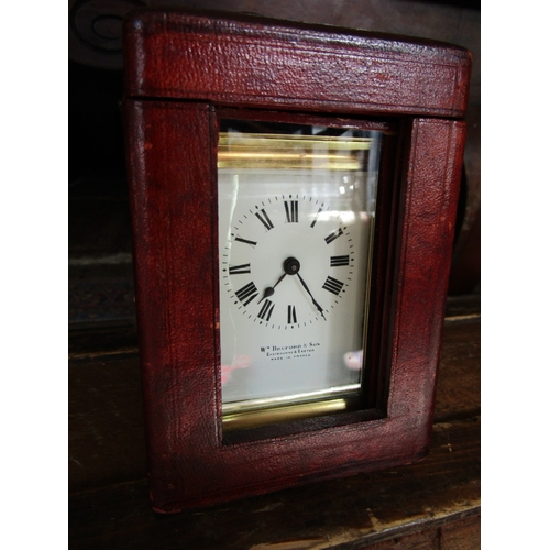 1121 - Leather Cased Brass Bound Carriage Clock Working with Key 6 Inches High Including Case