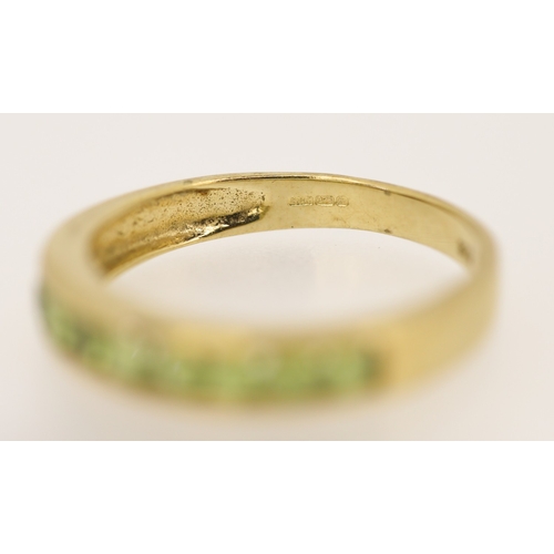 127 - Peridot Nine Stone Set Ring Mounted in 9 Carat Yellow Gold Ring Size N