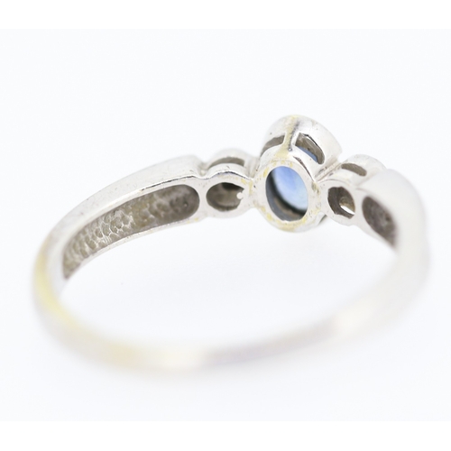 129 - Bezel Set Sapphire and Diamond Set Ring Mounted in 9 Carat White Gold Ring Size O and a Half