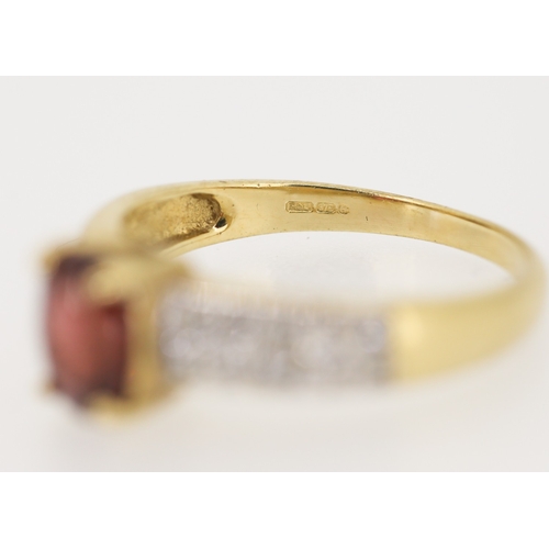 133 - Garnet Set Ring Mounted in 9 Carat Yellow Gold Further Diamond Insets to Shoulders Ring Size N