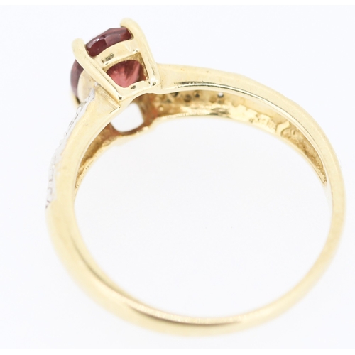 133 - Garnet Set Ring Mounted in 9 Carat Yellow Gold Further Diamond Insets to Shoulders Ring Size N