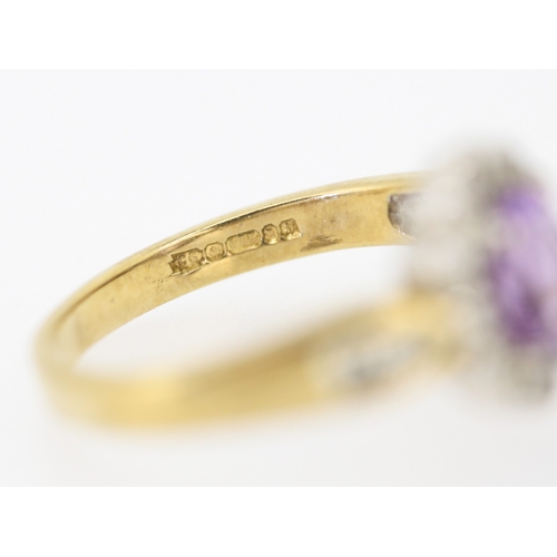 144 - Amethyst Set Ladies Ring with Diamond Insets Mounted in 9 Carat Yellow Gold Ring Size N and a Half