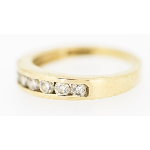 147 - Diamond Seven Stone Channel Set Ring Mounted in 9 Carat Yellow Gold Ring Size K and a Half