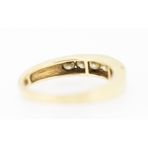 147 - Diamond Seven Stone Channel Set Ring Mounted in 9 Carat Yellow Gold Ring Size K and a Half