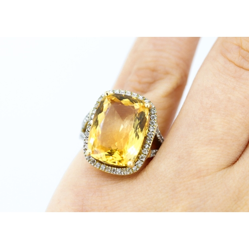 157 - Citrine Halo Set Ring Mounted in 18 Carat Yellow Gold Ring Size K