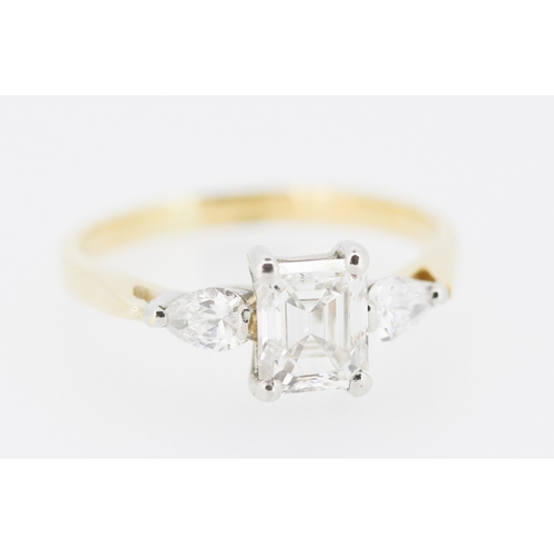 16 - Emerald Cut Diamond Centre Stone Ring with Pear Cut Diamonds Set to Shoulders Mounted on 18 Carat Ye... 