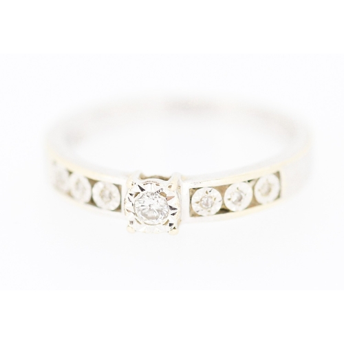 171 - Ladies Diamond Set Ring Rub Over Setting Mounted in 18 Carat White Gold further Diamonds Set to Shou... 