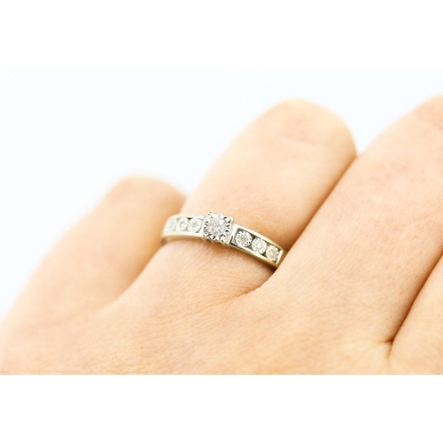 171 - Ladies Diamond Set Ring Rub Over Setting Mounted in 18 Carat White Gold further Diamonds Set to Shou... 