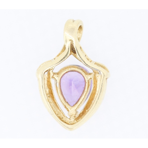 187 - Attractively Detailed Pear Cut Amethyst and Diamond Set Pendant Mounted in 9 Carat Yellow Gold 2cm H... 