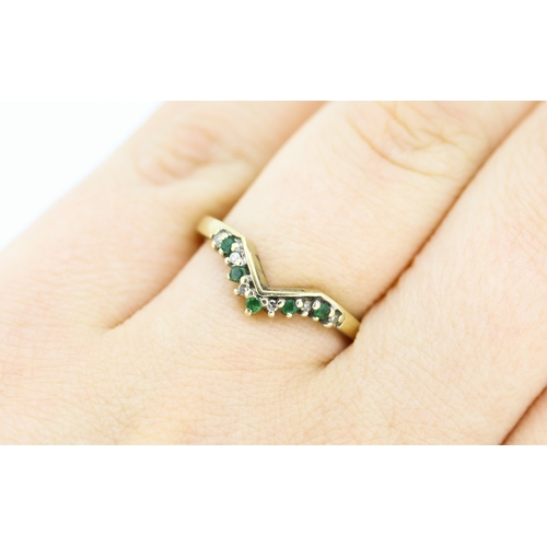 188 - Emerald and Diamond Set Wishbone Ring Mounted in 9 Carat Yellow Gold Ring Size P and a Half