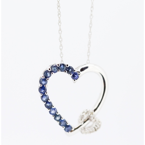 194 - Sapphire and Diamond Set Heart Form Pendant Mounted in 9 Carat White Gold 2cm High Set on 9 Carat Wh... 