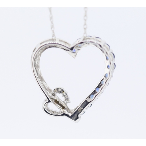 194 - Sapphire and Diamond Set Heart Form Pendant Mounted in 9 Carat White Gold 2cm High Set on 9 Carat Wh... 